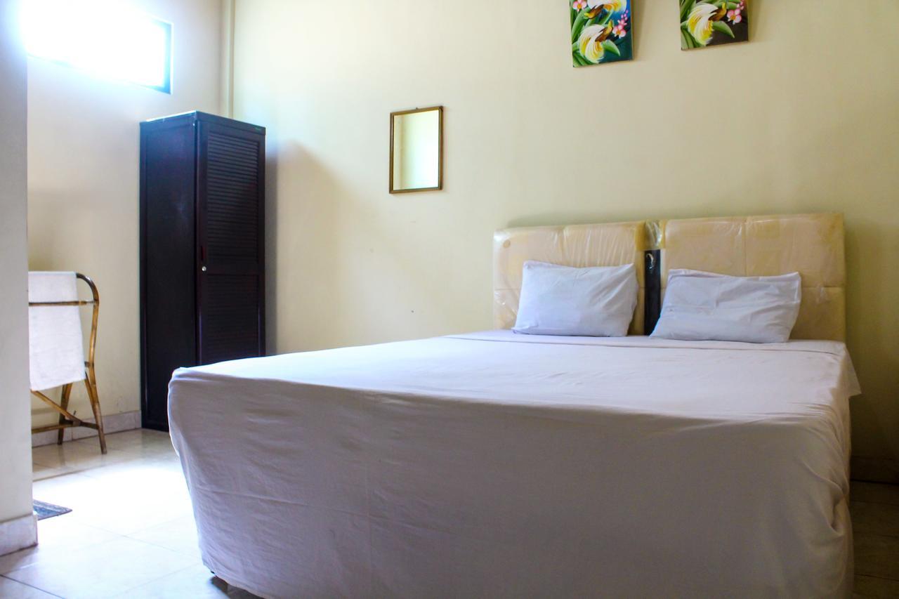 Lolo Beach Inn Легиан Экстерьер фото